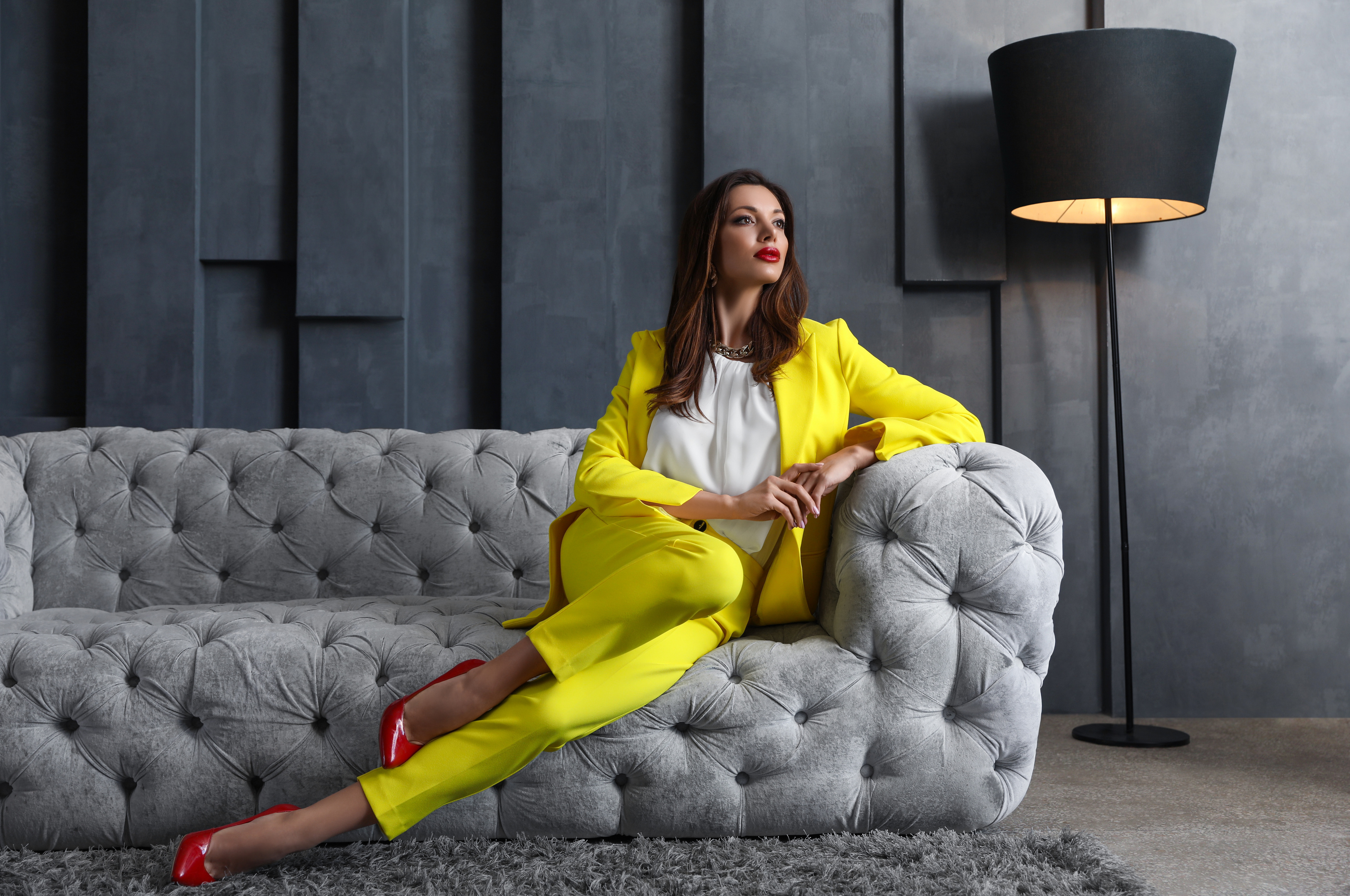Businesswoman Posing on a Luxurious Couch 